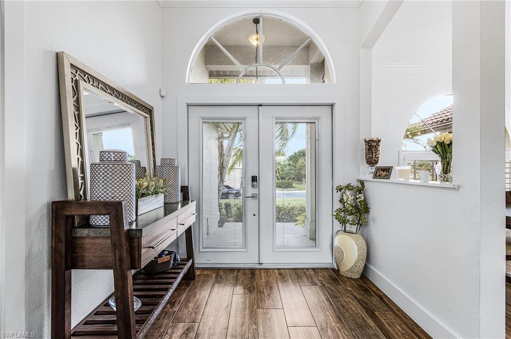 Image 3: Entryway with french doors and plenty of natural light