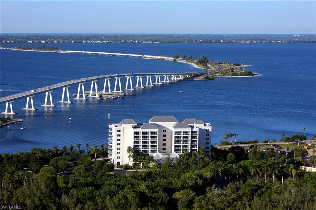 Image 2: Drone / aerial view of a notable bridge and a large body of water