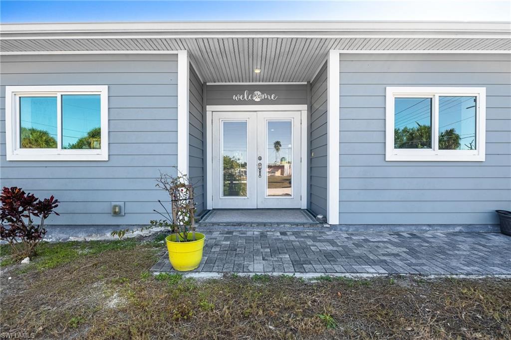 Image 2: Doorway to property featuring french doors