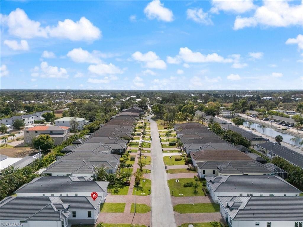 Image 2: Bird's eye view featuring a water view and a residential view