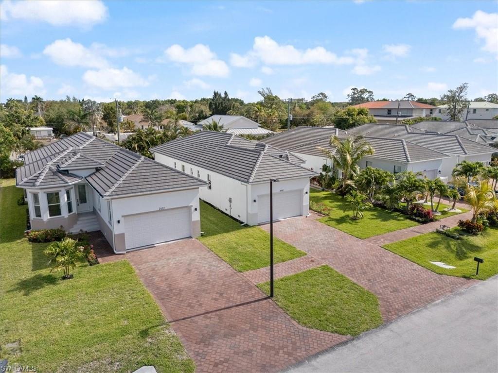 Image 4: Drone / aerial view featuring a residential view
