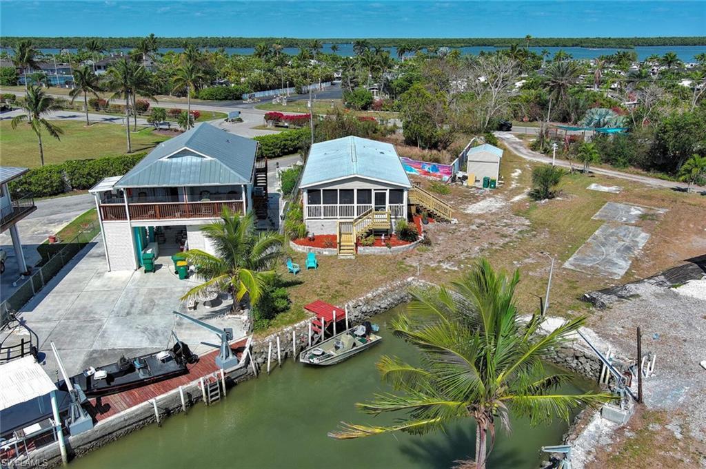 Image 2: Birds eye view of property featuring a water view