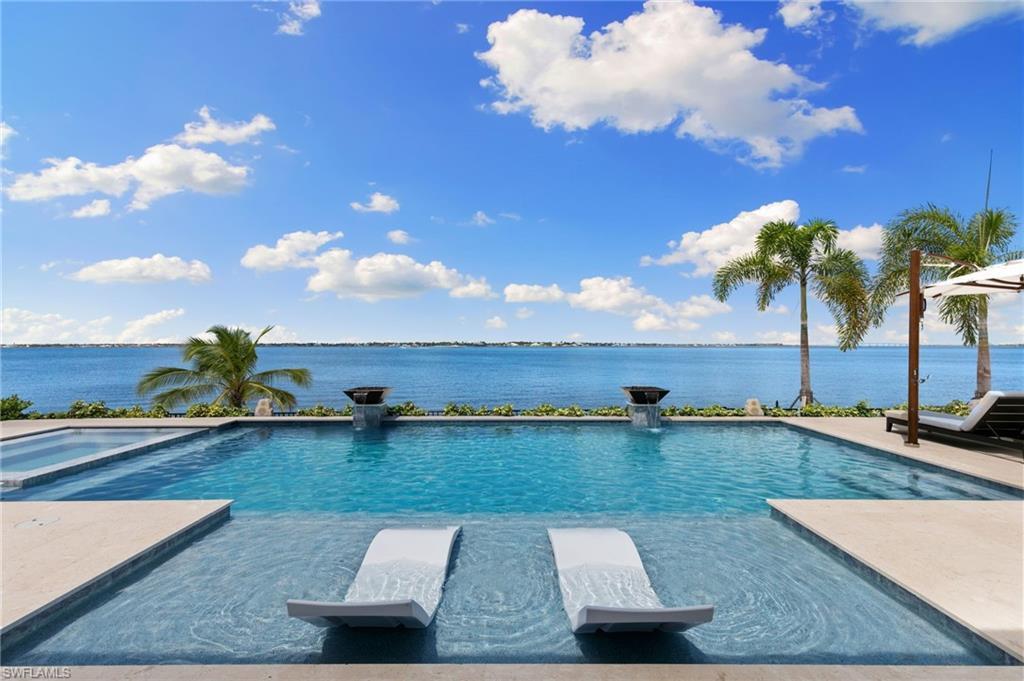 Image 1: Every detail is designed to inspire&mdash;culminating in breathtaking, sweeping river views that awaken the senses. 10 ft. sliders that pocket back offering the quentessential indoor outdoor living experience.