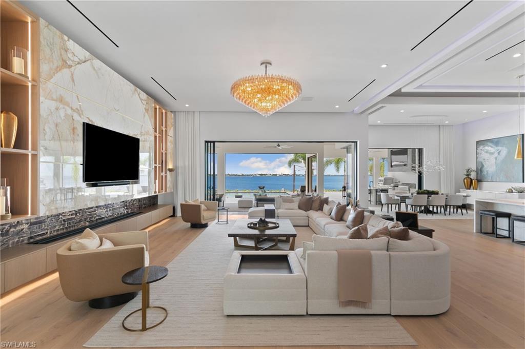 Image 4: 1,400 feet of covered lanai living area, the ultimate oasis for private alfresco relaxation.