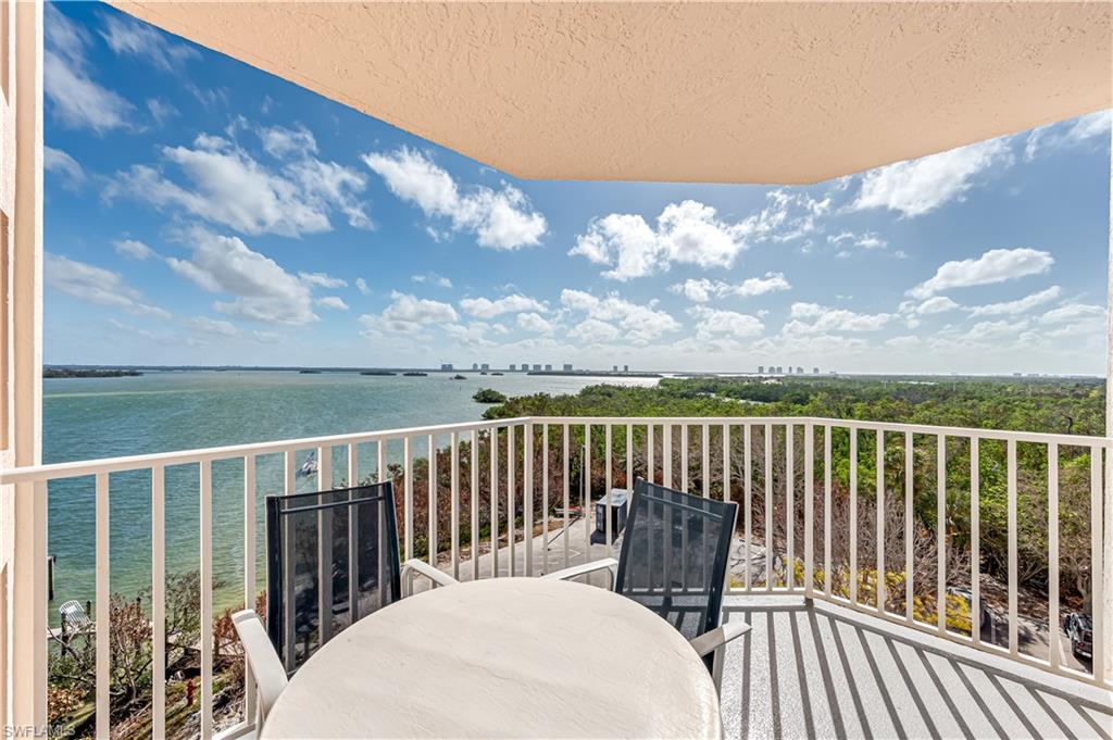 Image 4: Balcony featuring a water view Virtually edited image