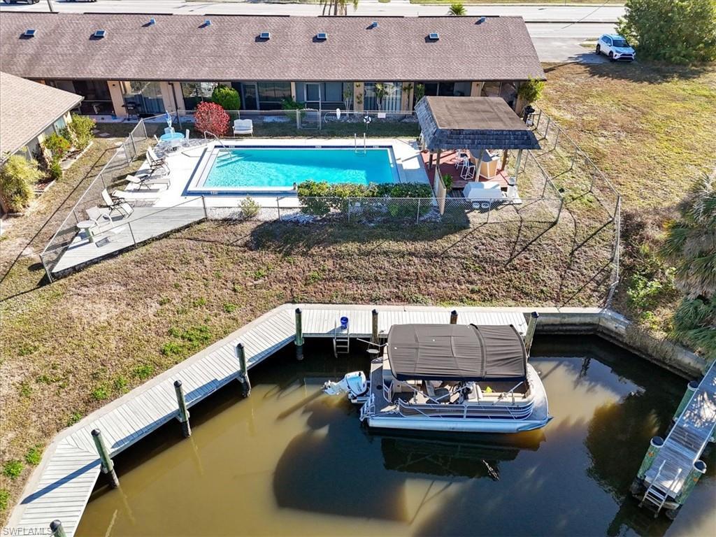 Image 1: Aerial view of a pool
