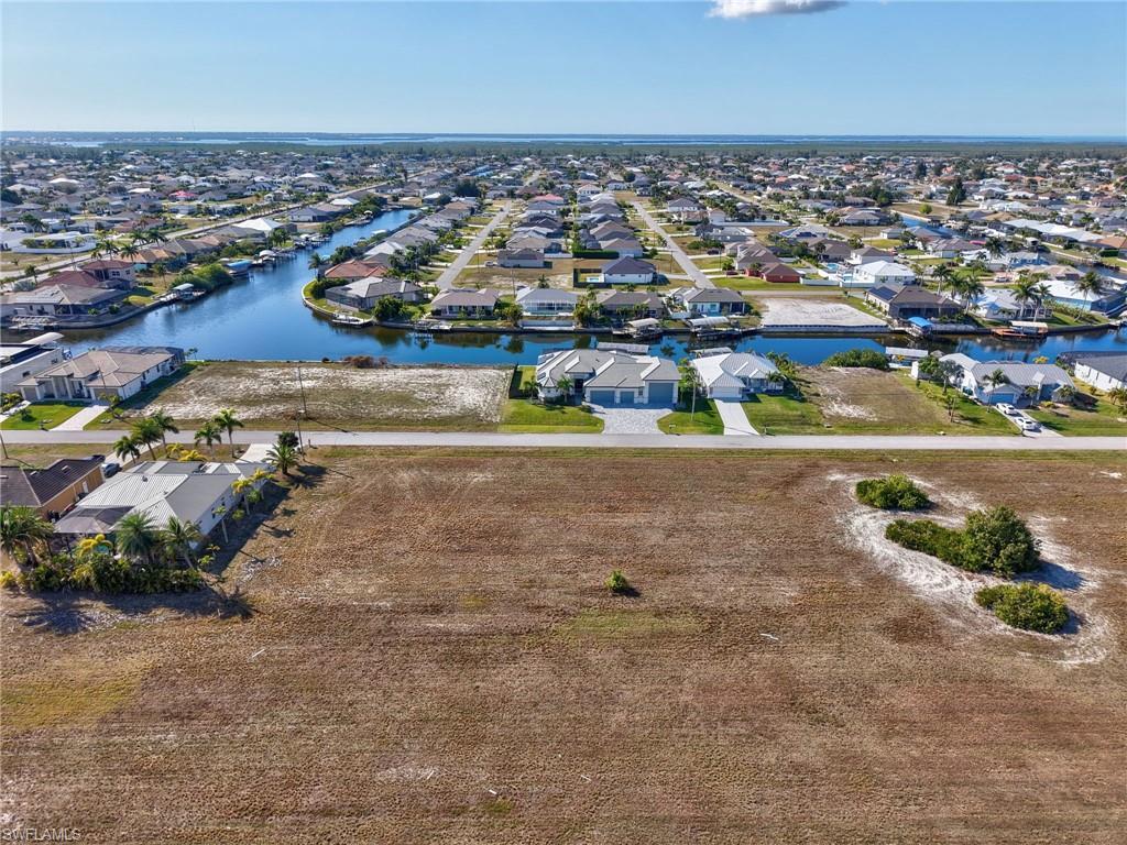 Image 2: Aerial view of property's location featuring nearby suburban area