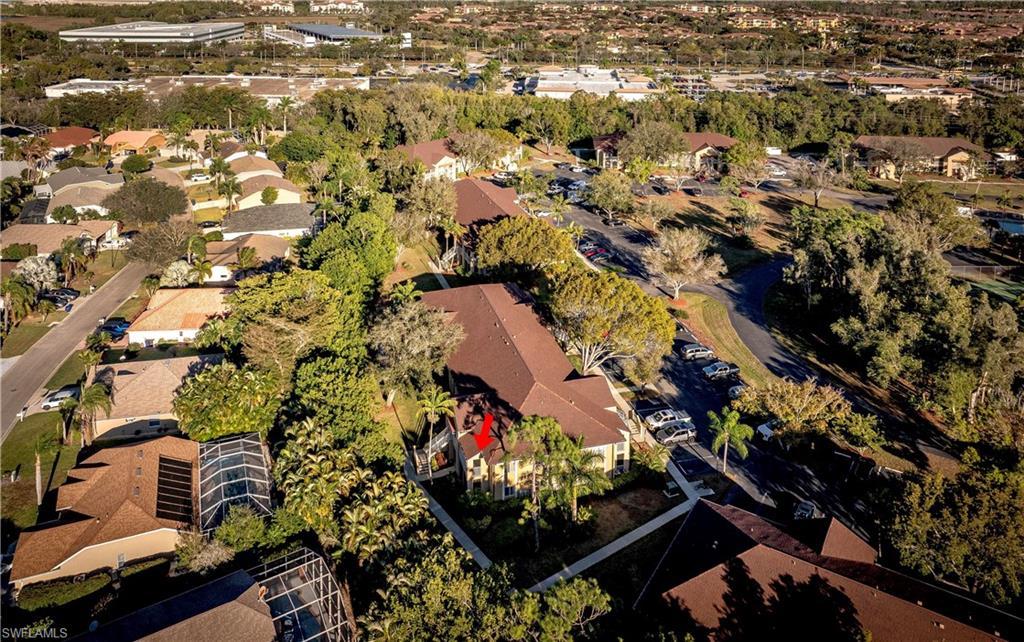 Image 3: Aerial view of property and surrounding area with nearby suburban area