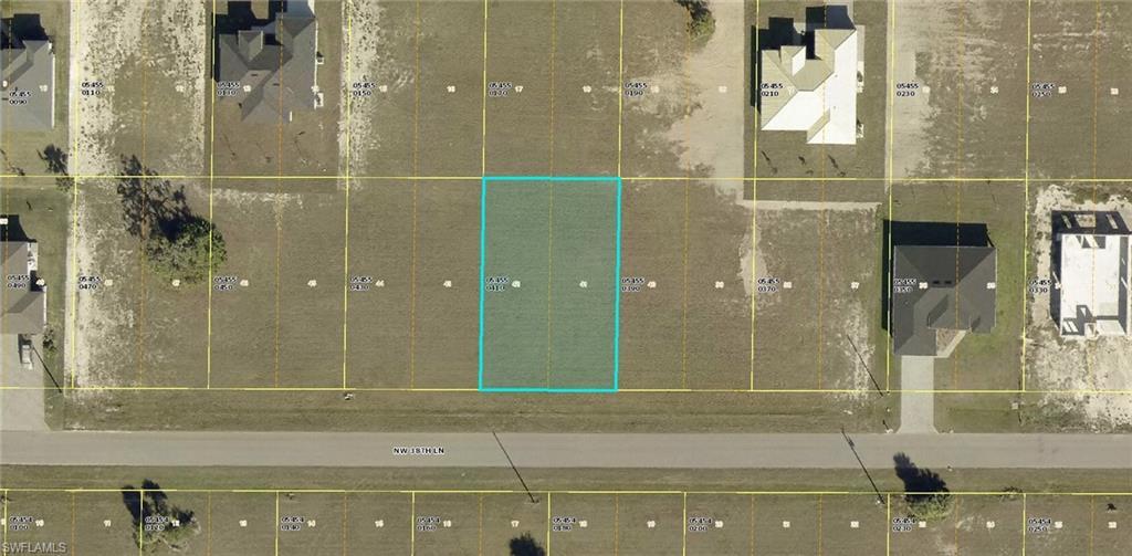 Image 1: Aerial view of property's location featuring property boundaries highlighted