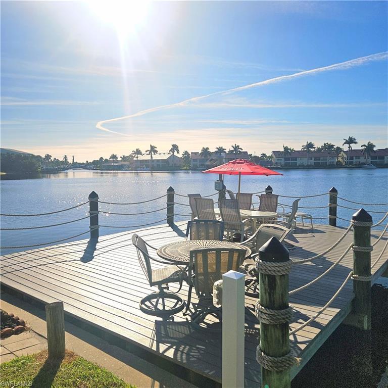 Image 3: Dock with a deck with water view