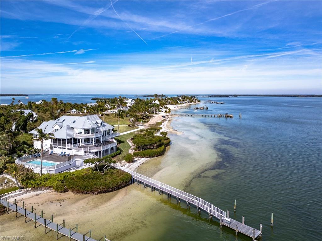 Image 4: Aerial view, pool and dock