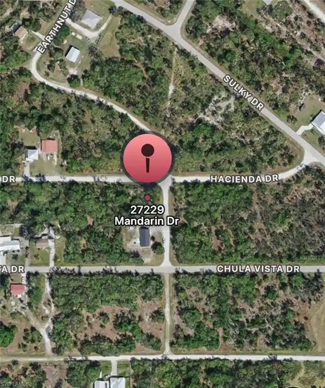 Image 1: Aerial overview of property's location with property parcel outlined