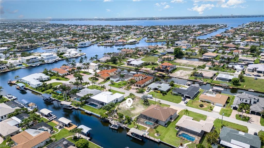 Image 1: Direct Sailboat Access Lot- 5 Minutes to the Caloosahatchee River.