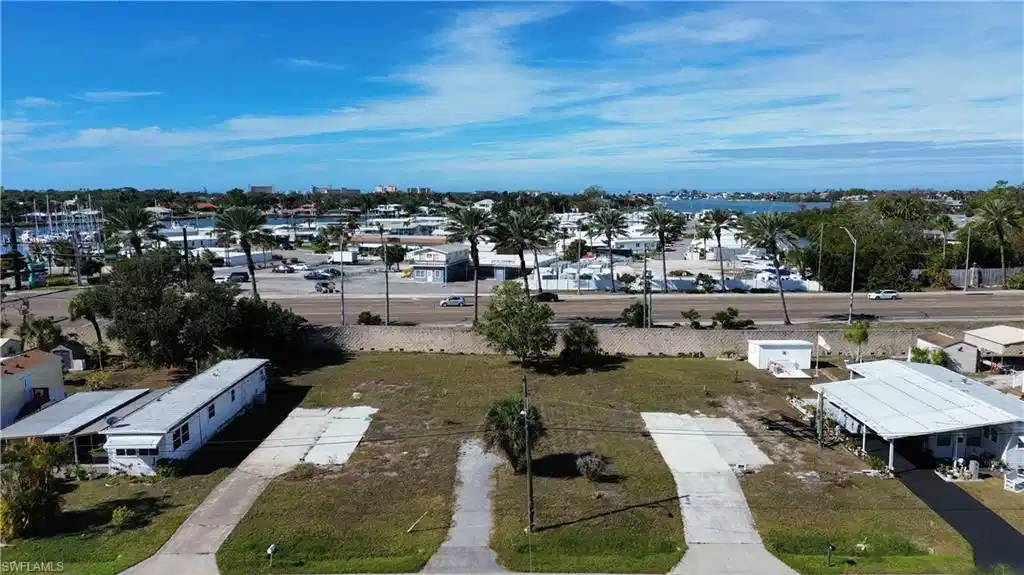 Image 1: Aerial perspective of suburban area