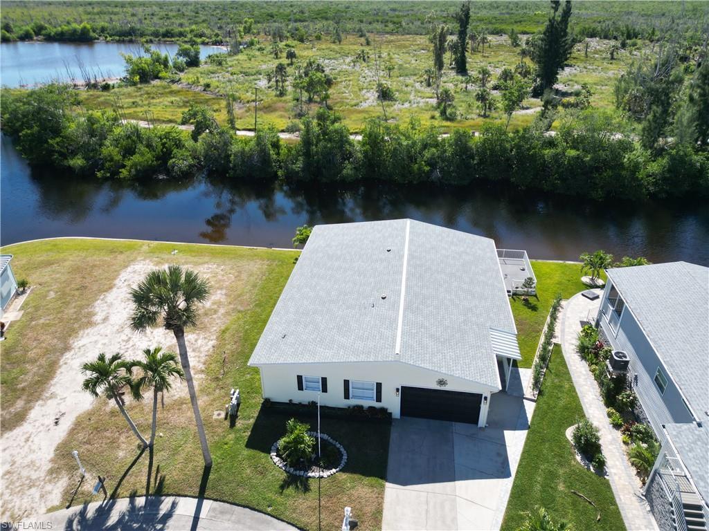 Image 3: Home backs to undevelopable wilderness area stretching almost all the way to Fort Myers Beach