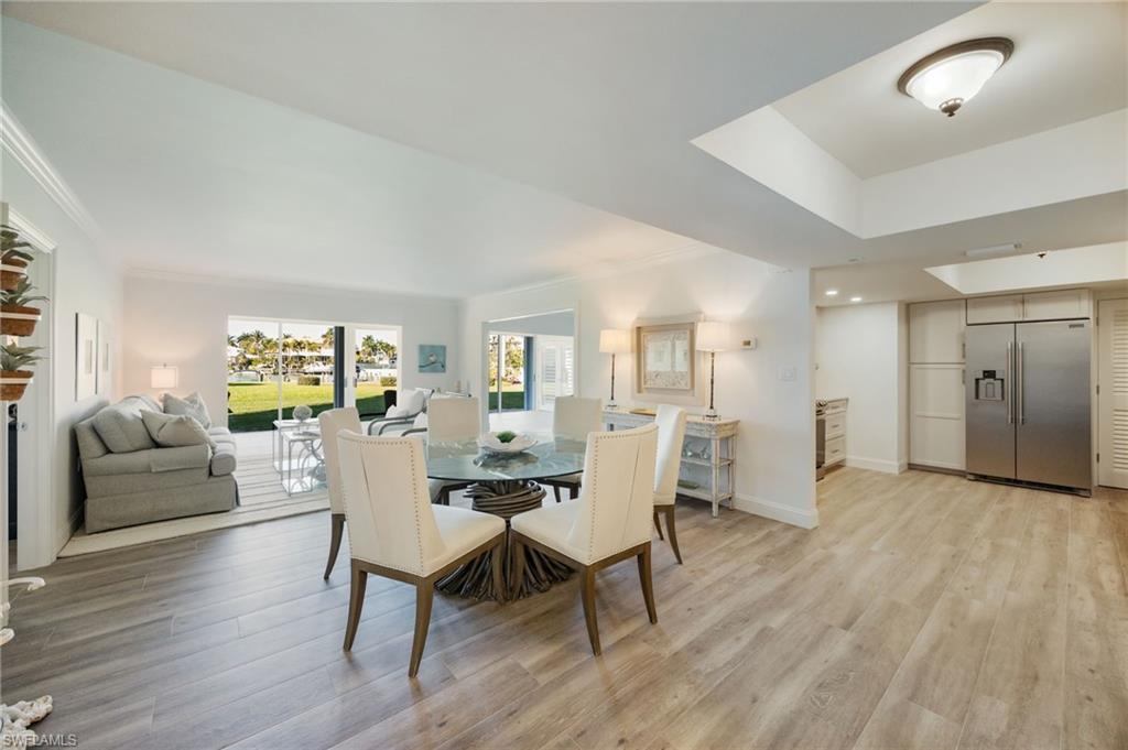 Image 1: Completely renovated coastal decor throughout.
