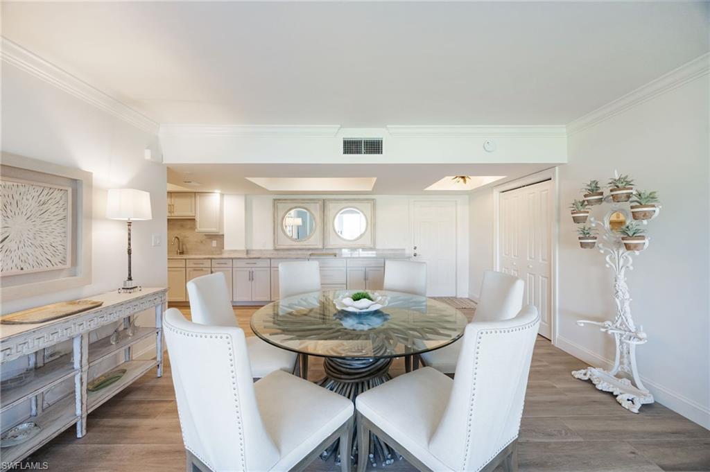 Image 2: Spacious dining with counter serving area