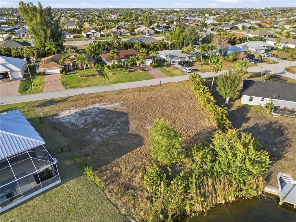 Image 3: Aerial view of residential lot