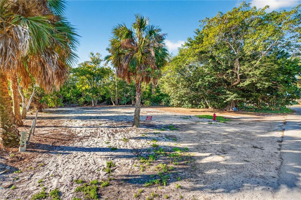 Image 3: With no HOA restrictions, you have the flexibility to design a custom coastal retreat or create a high-potential investment property.