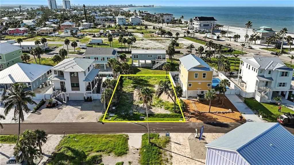 Image 1: Your beach oasis awaits on this Prime lot - Virtually Edited Image