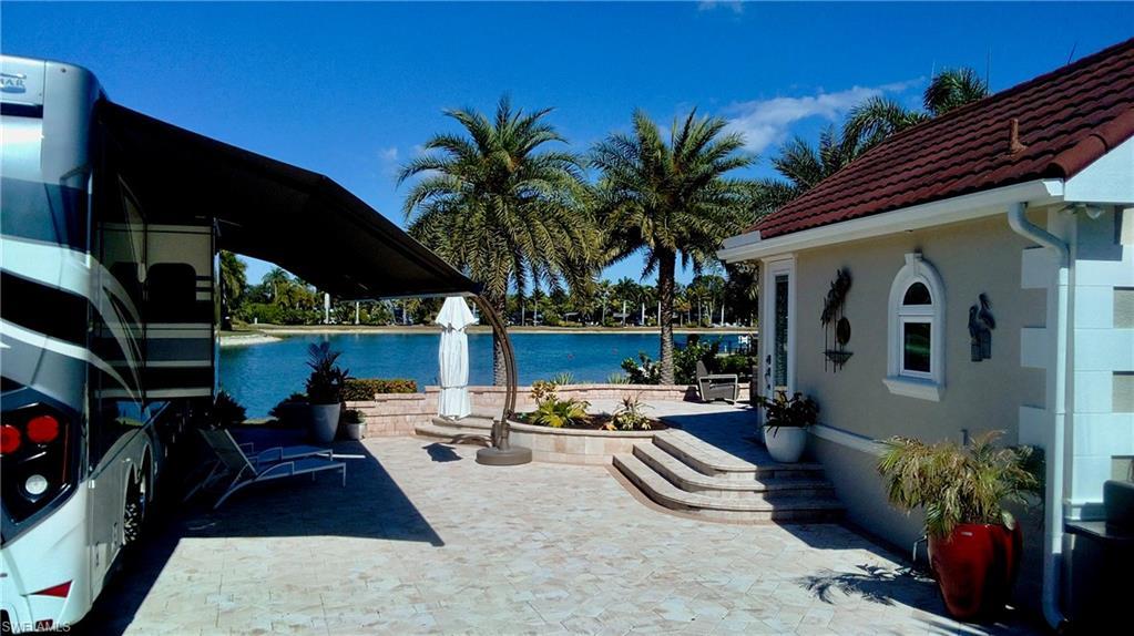 Image 3: View of patio featuring a water view