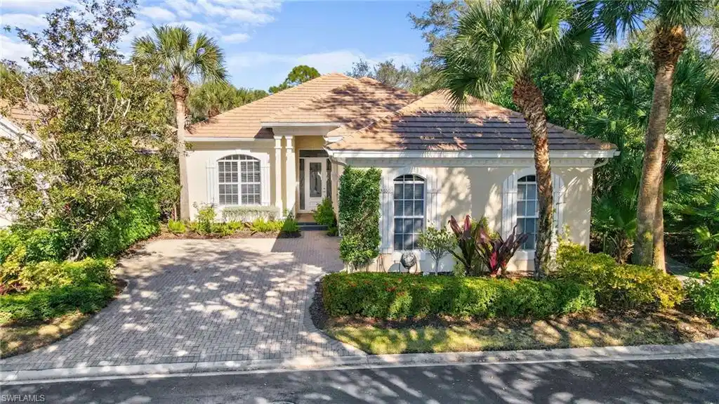 Image 1: Mediterranean / spanish home featuring stucco siding and a tiled roof