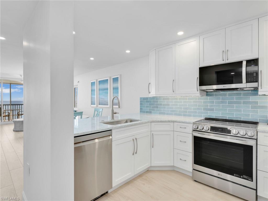 Image 4: Fully stocked kitchen featuring, Quartz Countertops, brand new cabinetry, brand new appliances, under mount lighting