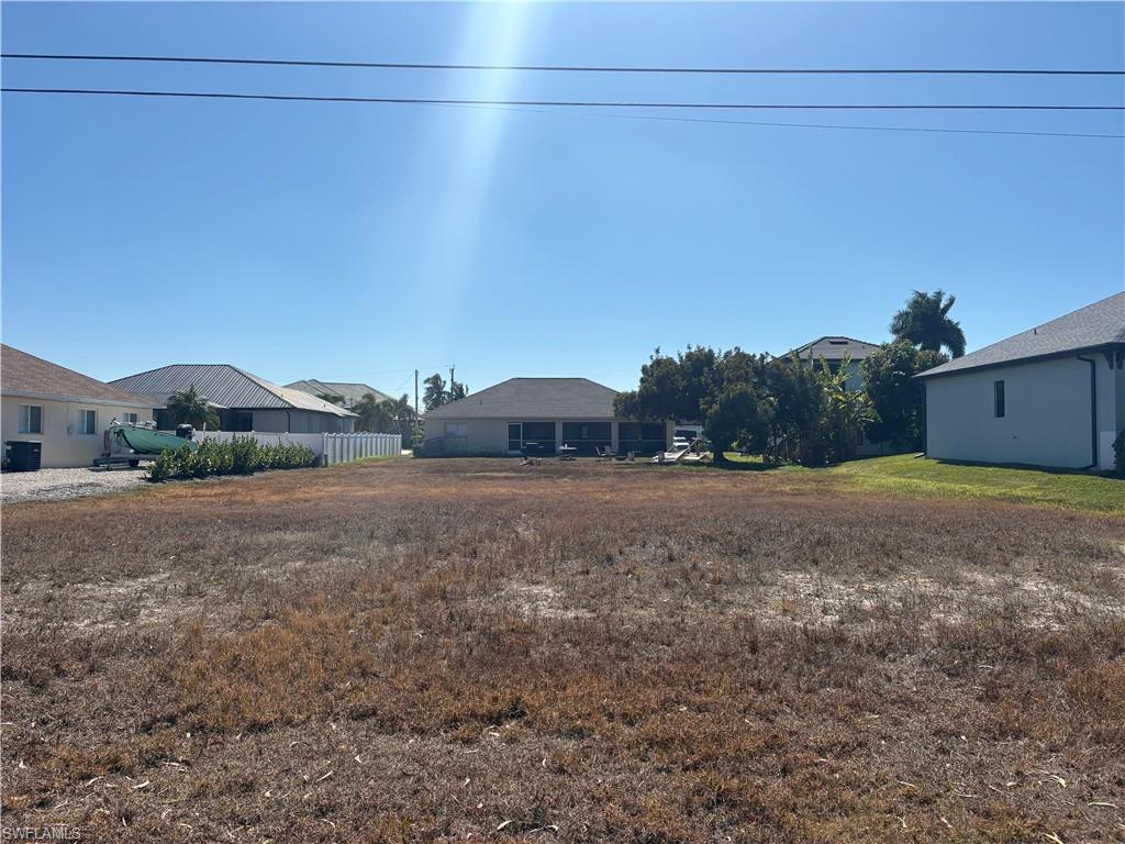 Image 1: View of yard featuring a residential view