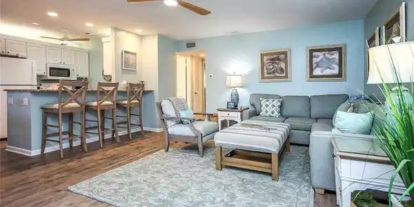 Image 2: Living room with visible vents, a ceiling fan, wood finished floors, recessed lighting, and baseboards