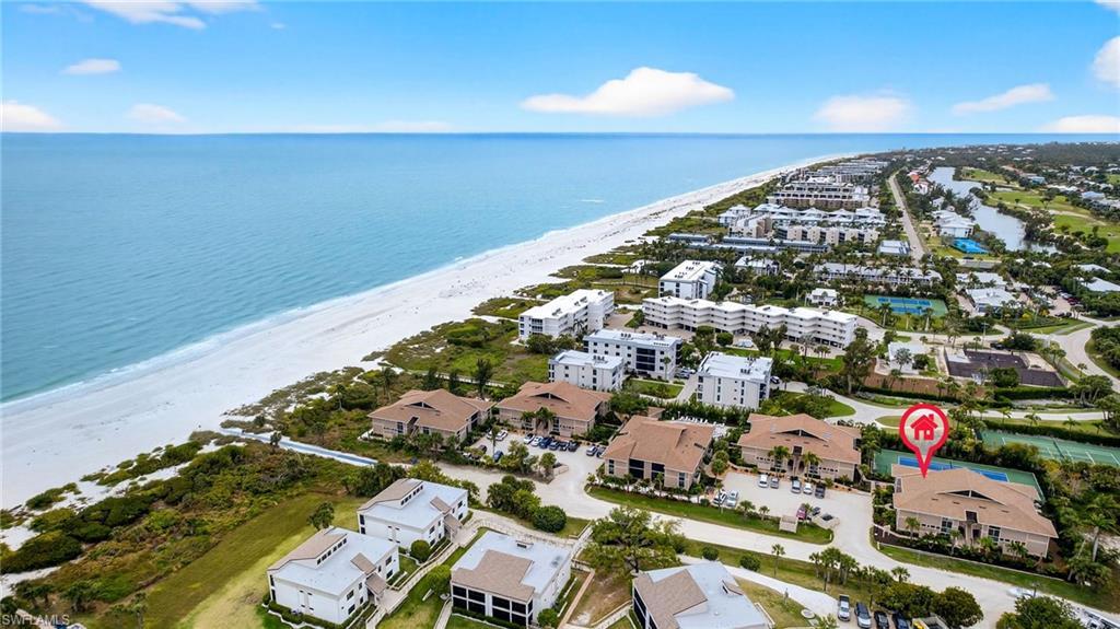 Image 2: Drone / aerial view of waterfront with a beach