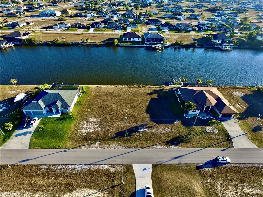 Image 4: View of property location with a large body of water