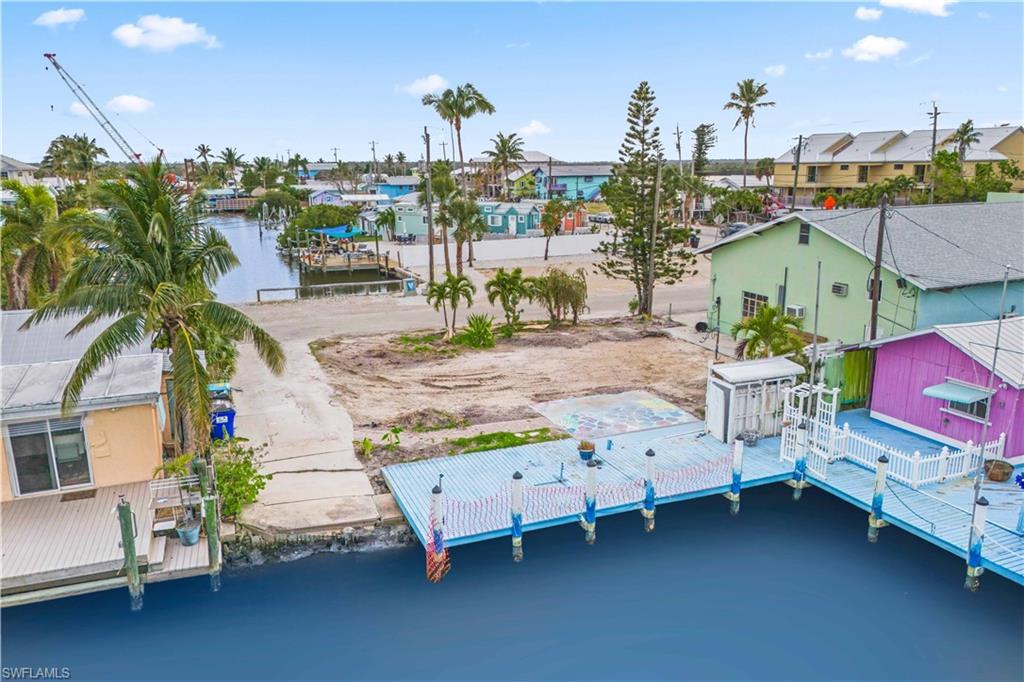 Image 4: An extensive dock is already in place, perfect for boating, kayaking, or simply enjoying the serene waterfront setting.