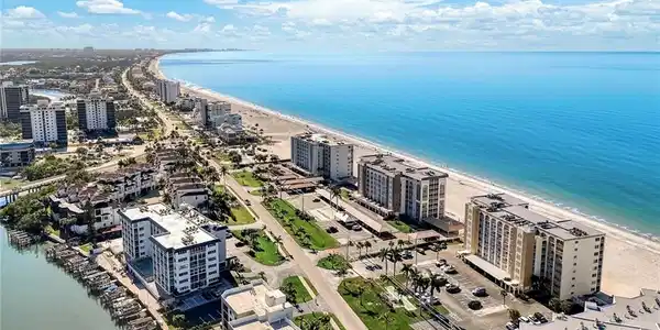 Image 2: View of urban area with expansive coastline