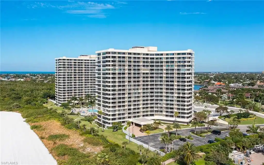Image 1: View of apartment building / complex