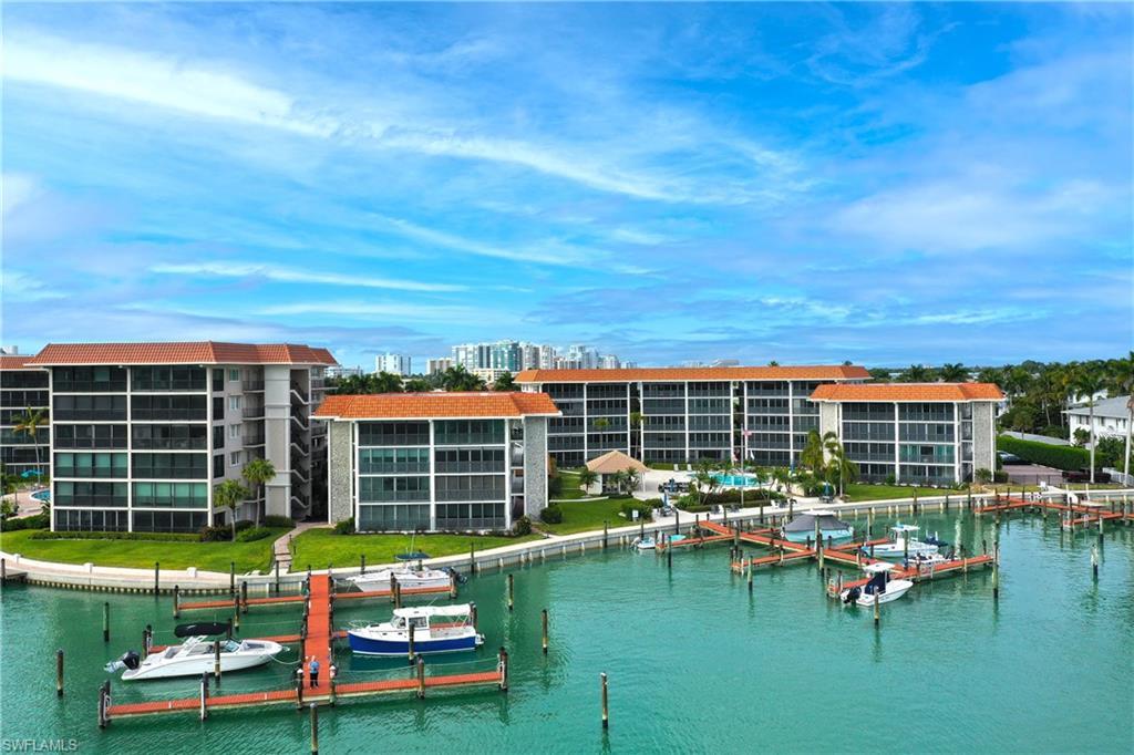Image 3: Water view featuring a dock
