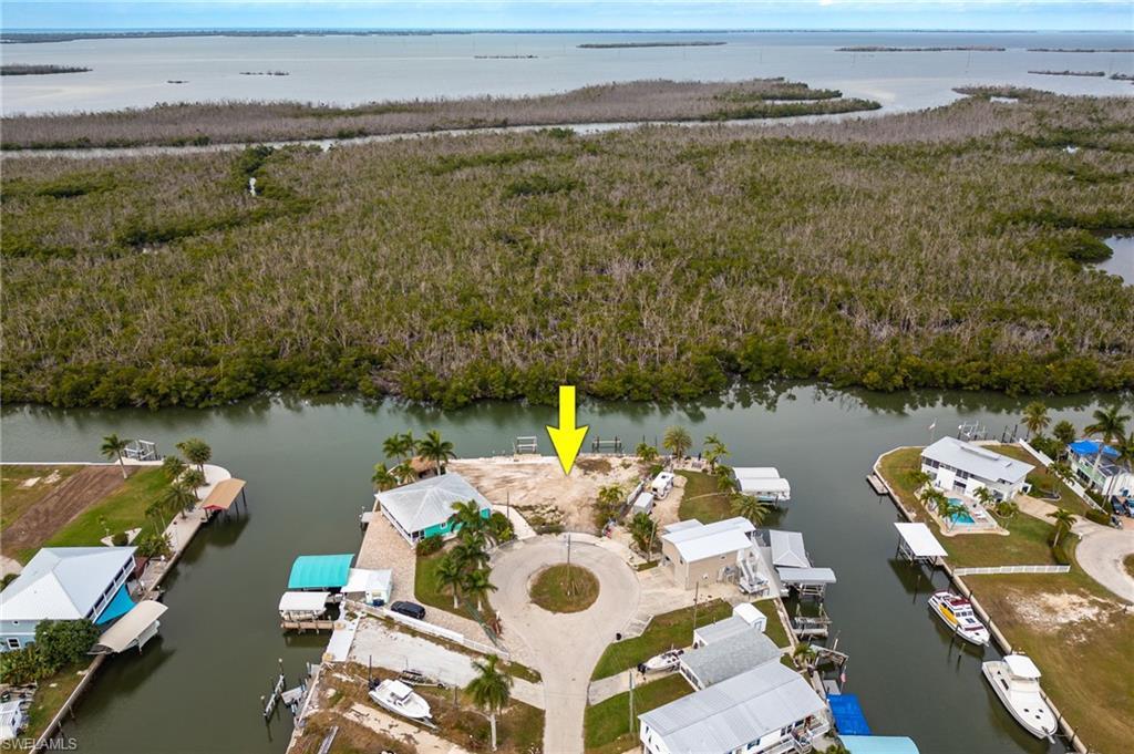 Image 1: Aerial view of property facing west