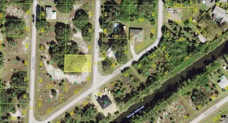 Image 1: Aerial map of property and surrounding area featuring property boundaries highlighted