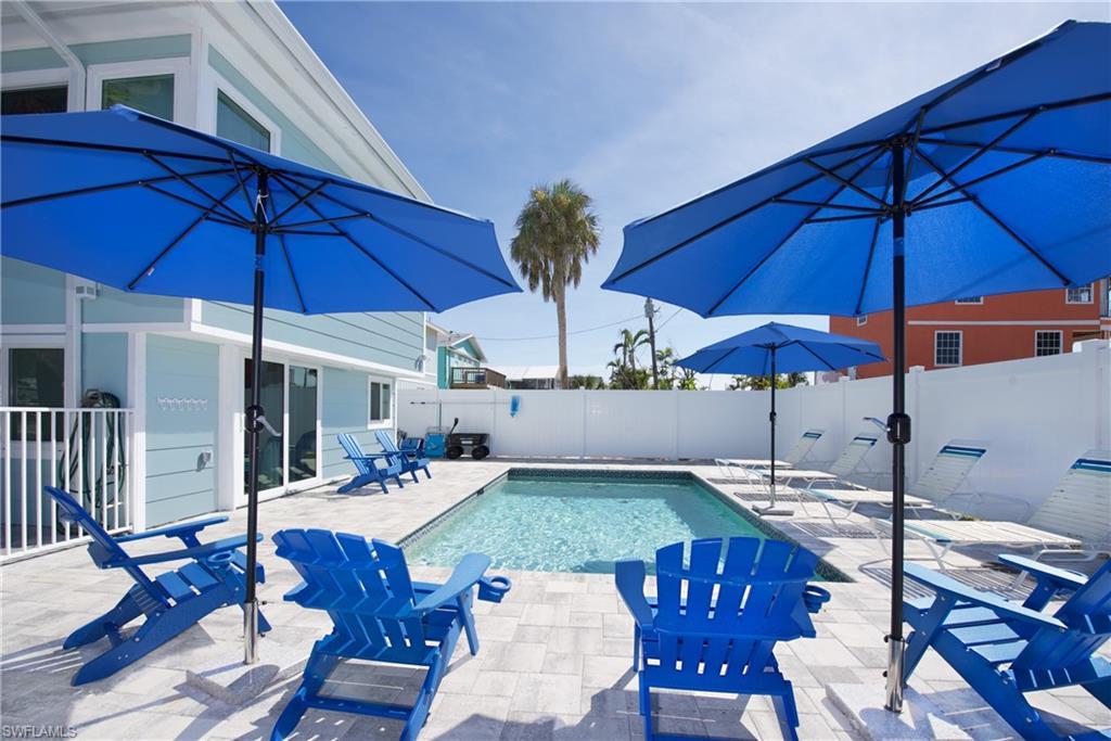 Image 2: Outdoor oasis with a refreshing pool - Virtually Edited Image