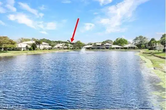 Image 1: Water view with nearby suburban area