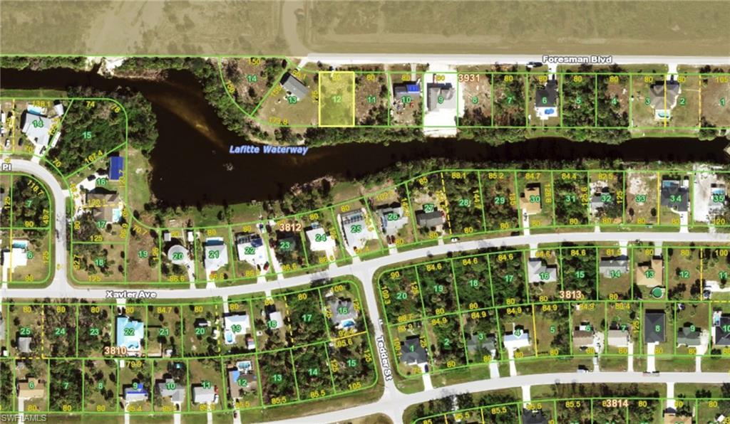 Image 1: Aerial view of property's location featuring property parcel outlined