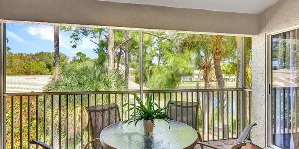 Image 2: Sunroom with a textured wall and plenty of natural light