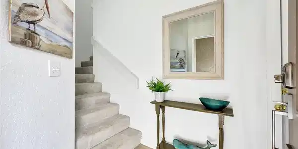 Image 4: Staircase with wood finished floors