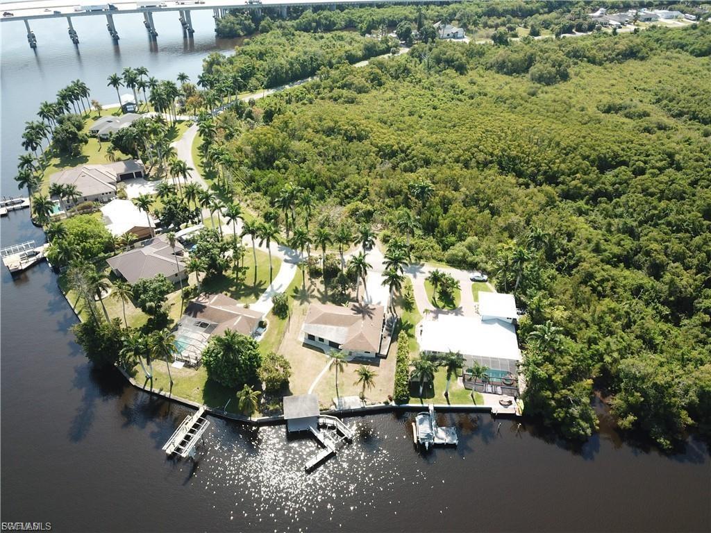 Image 3: View of property location with a nearby body of water and a notable bridge