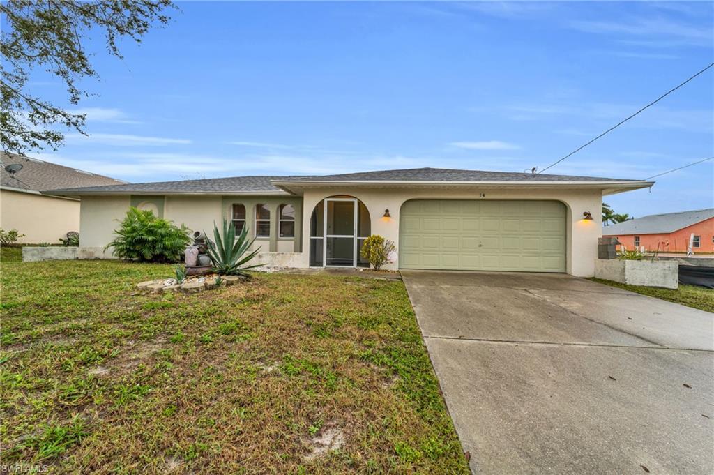 Image 1: Ranch-style house featuring stucco siding, concrete driveway, a front lawn, and an attached garage