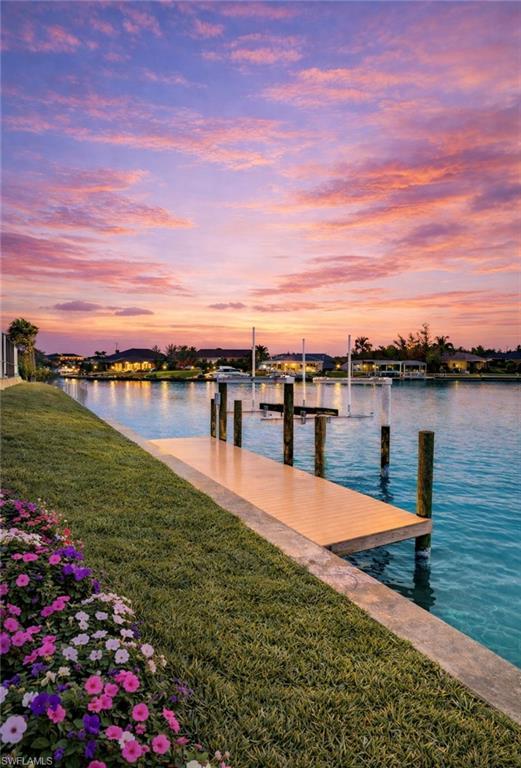 Image 3: Dock with a yard and a water view (Rendered photo)