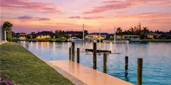 Image 3: Dock with a yard and a water view (Rendered photo)