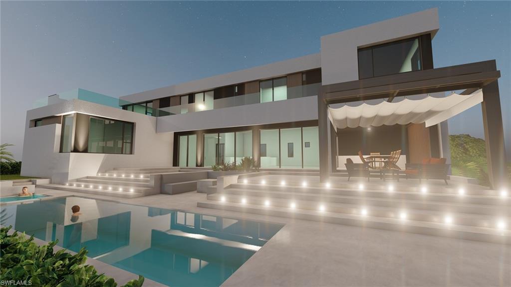 Image 2: Rear view of property with stucco siding, a patio, and an outdoor pool