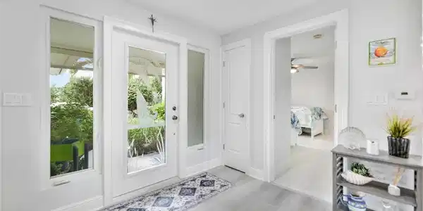 Image 4: Doorway featuring wood finished floors and recessed lighting