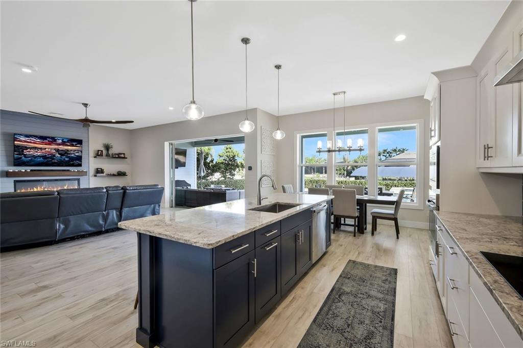 Image 1: An open, inviting great room with a seamless flow&mdash;perfect for entertaining and everyday living.