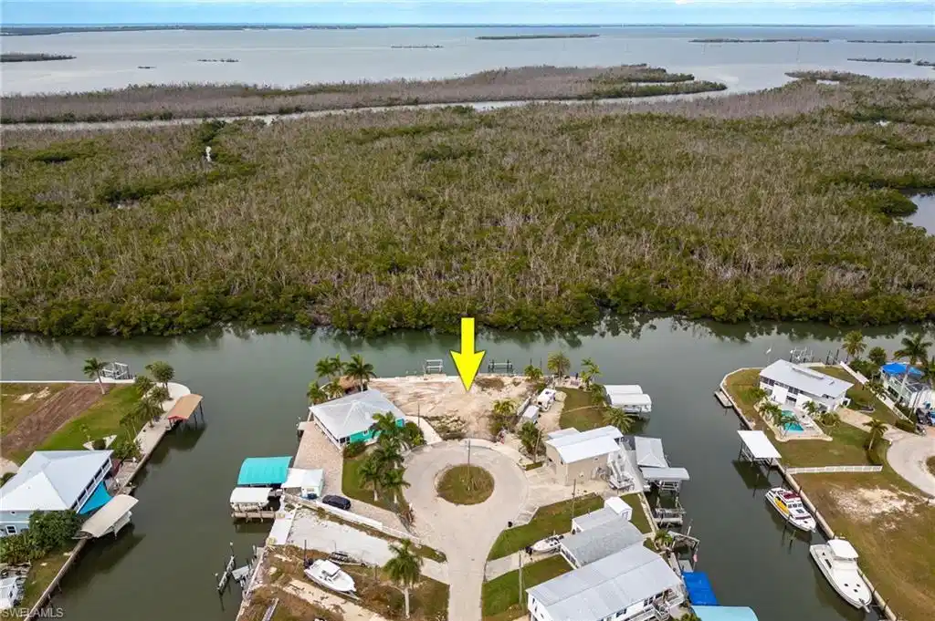 Image 1: Aerial view of property facing west